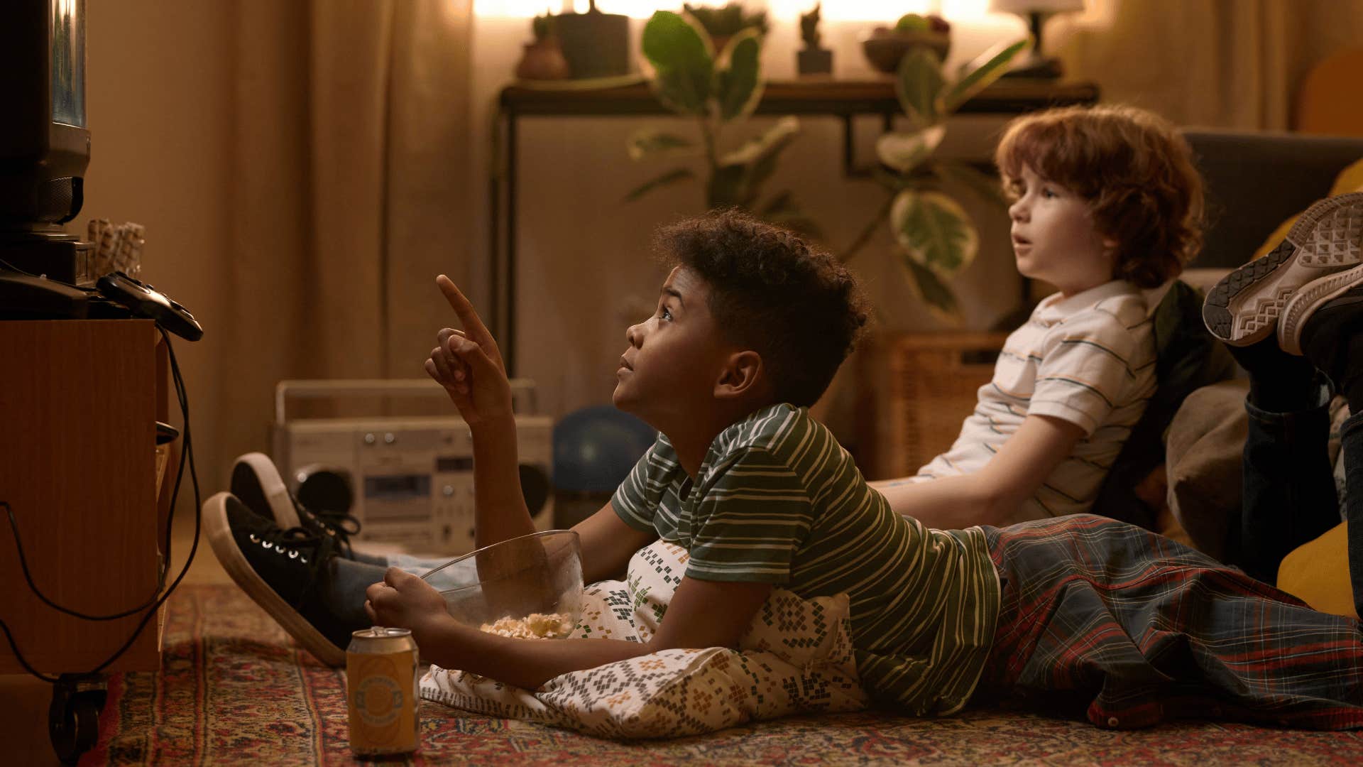 children watching morning cartoons with popcorn