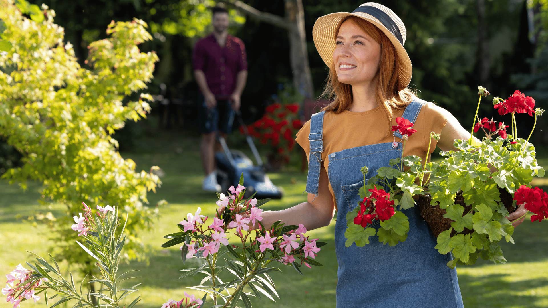 woman holding flowers smiling as she loves to spend time gardening