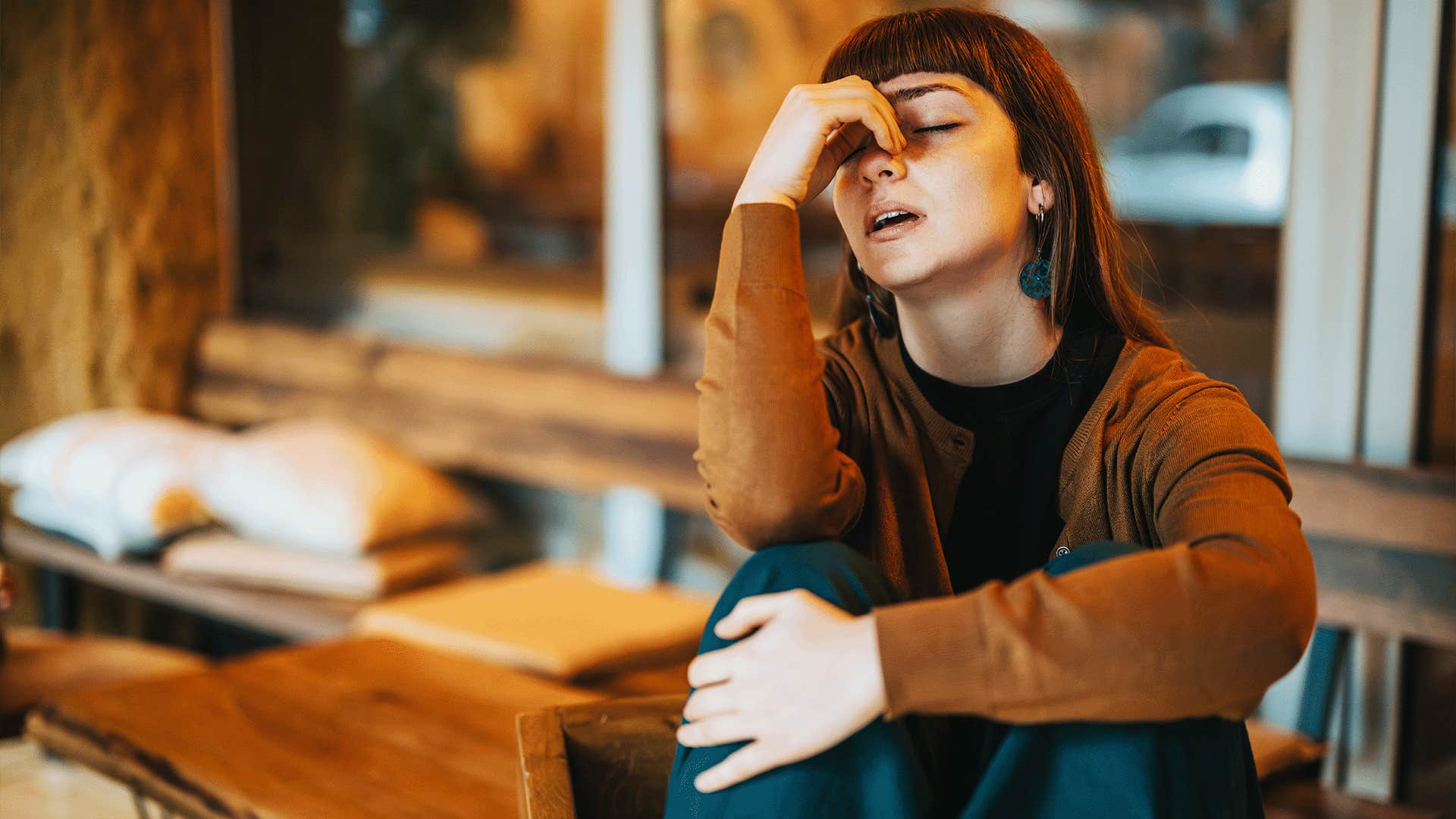 woman apologizes for things that aren't her fault because she felt like a burden growing up