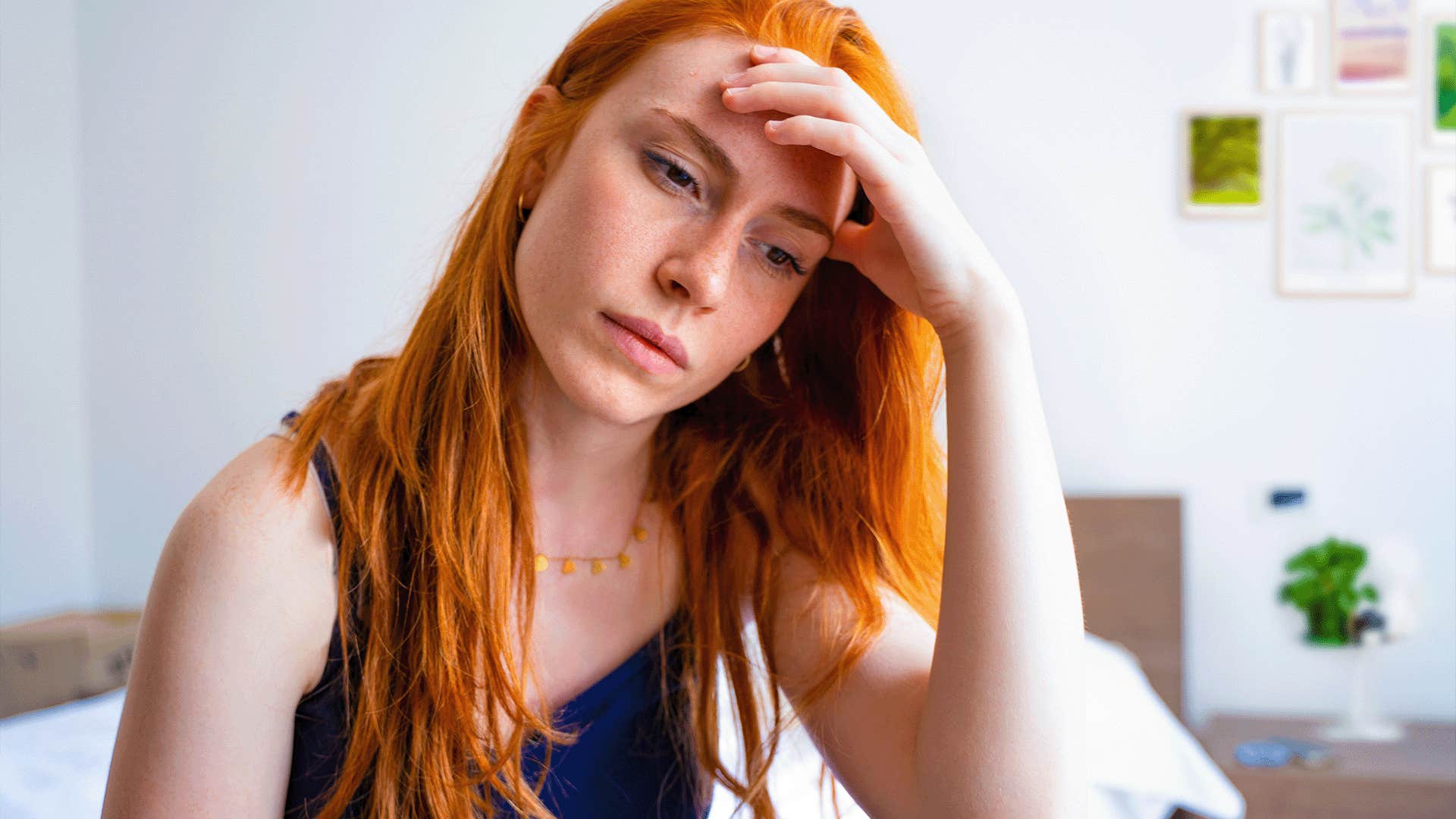 woman struggles with low self-esteem because she felt like a burden growing up