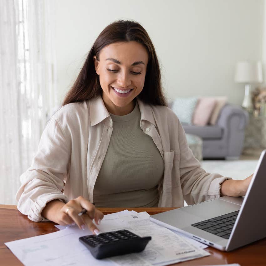 woman sleeps well at night because when she pays bills she knows where her money goes