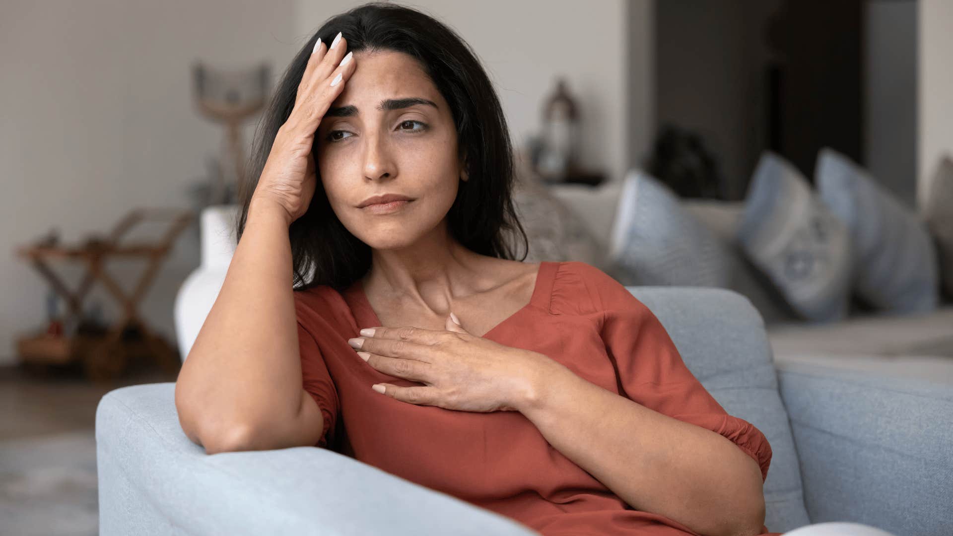 sad woman replaying old conversations in her mind