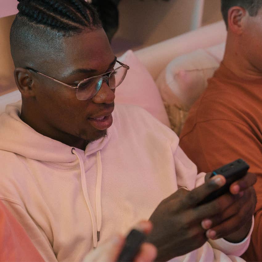 man sending a thoughtful thank you text to the host of a party the following day