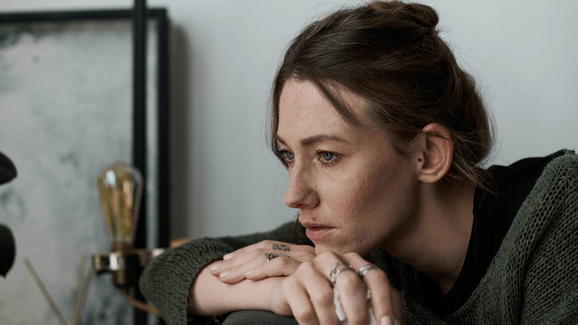 woman spacing out as she thinks people never change