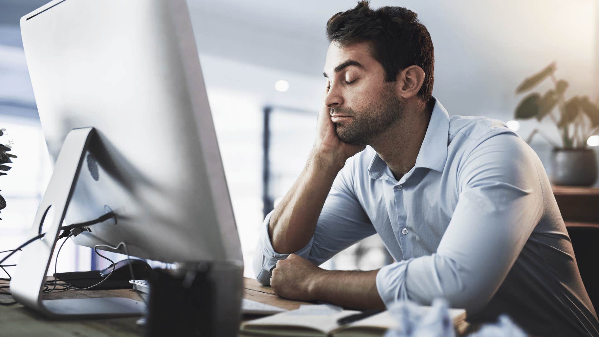 mentally and physically exhausted man saying my brain isn't working