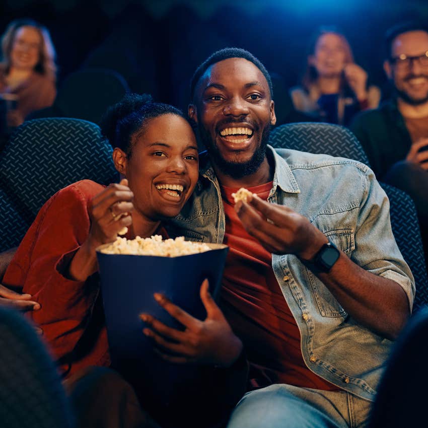 man at movies with girlfriend knows that his job is only part of his identity