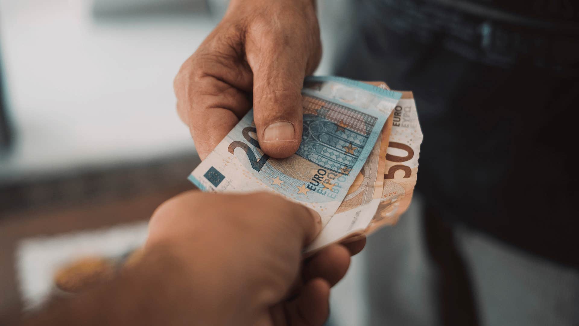 man using cash