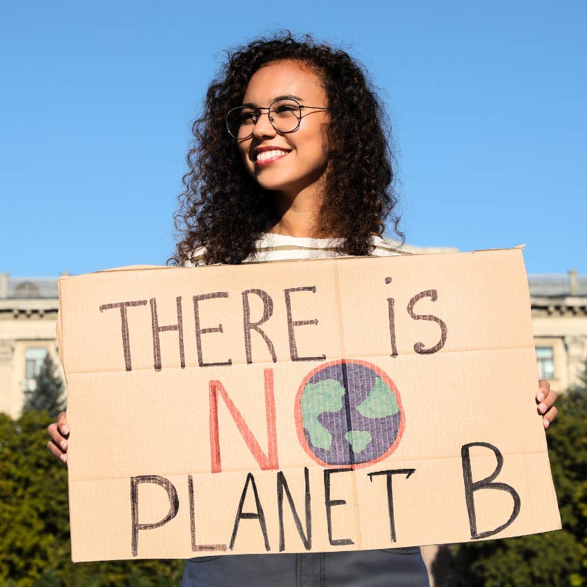 Younger woman caring about climate change outside