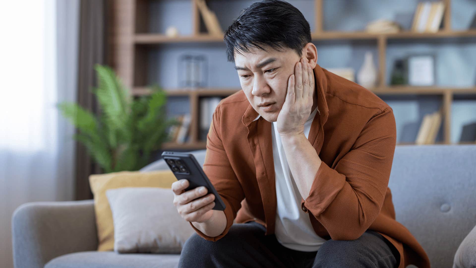 gen x man acting as his family's therapist on the phone