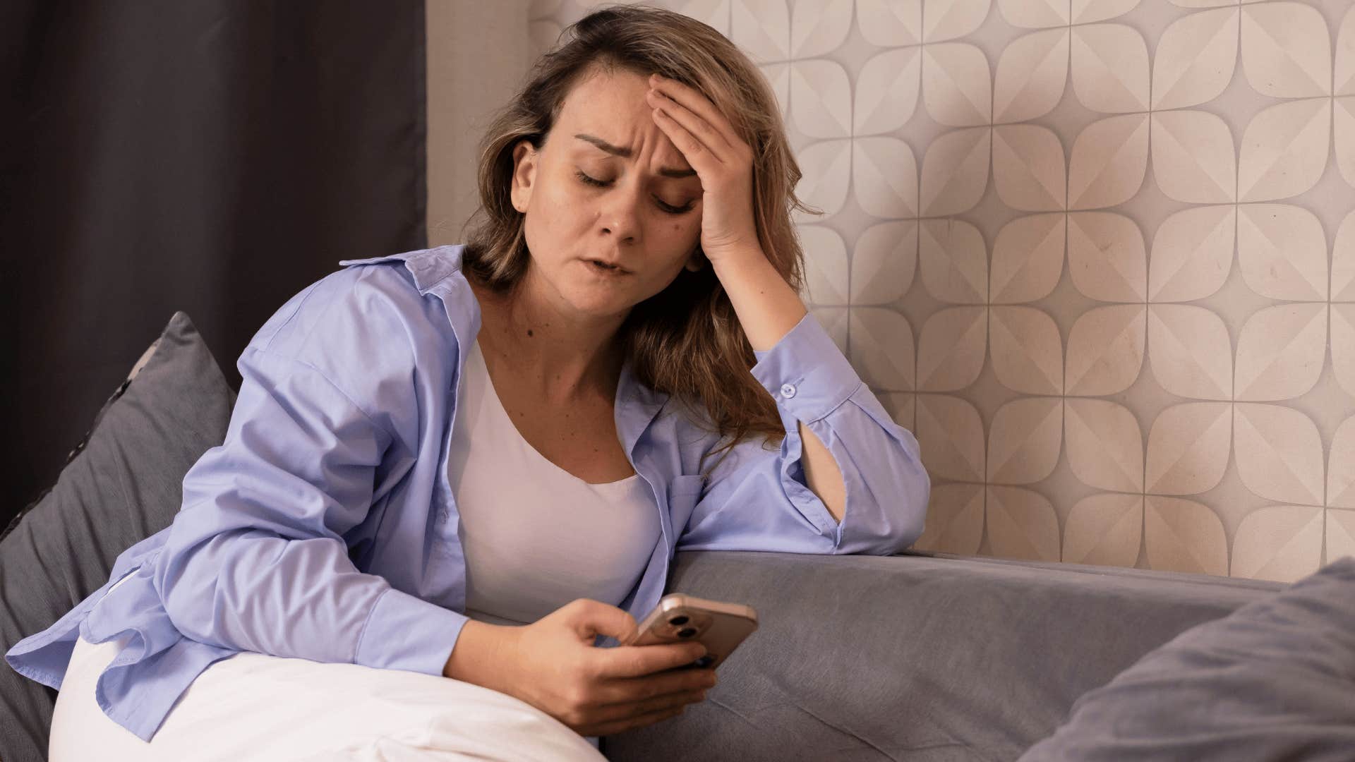 middle aged woman stressing over financially supporting her children
