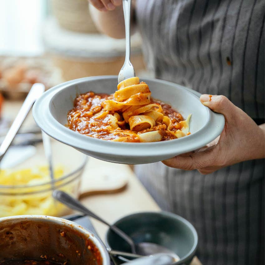 Freshly cooked pasta tossed with vegetables and simple pantry ingredients for an inexpensive meal