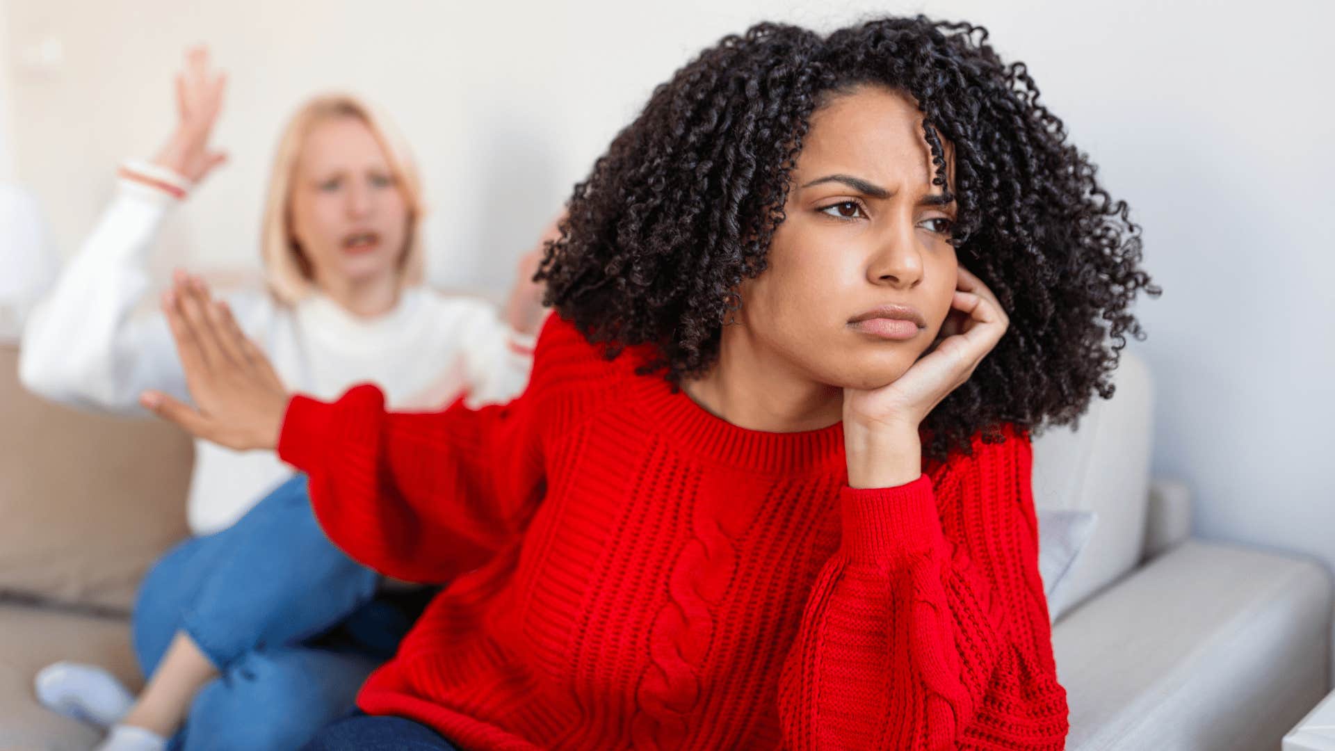 woman turned away from friend telling her i have other priorities