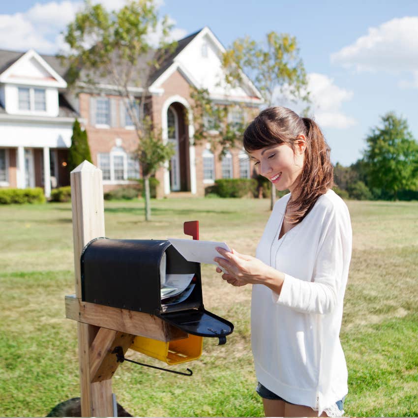 woman who has her life together checking her mail