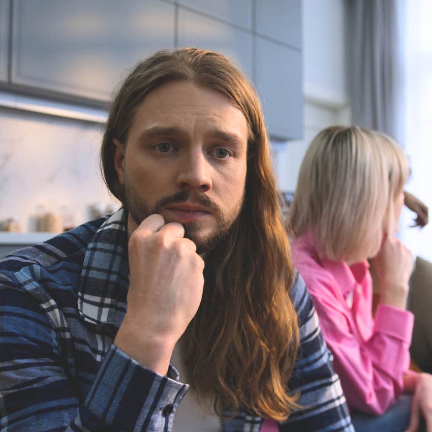pensive man deep in thought saying I feel like I forgot something to his friends