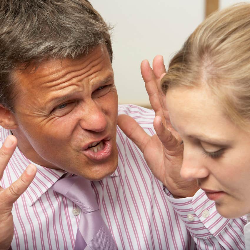 angry and immature man starting a fight with his wife