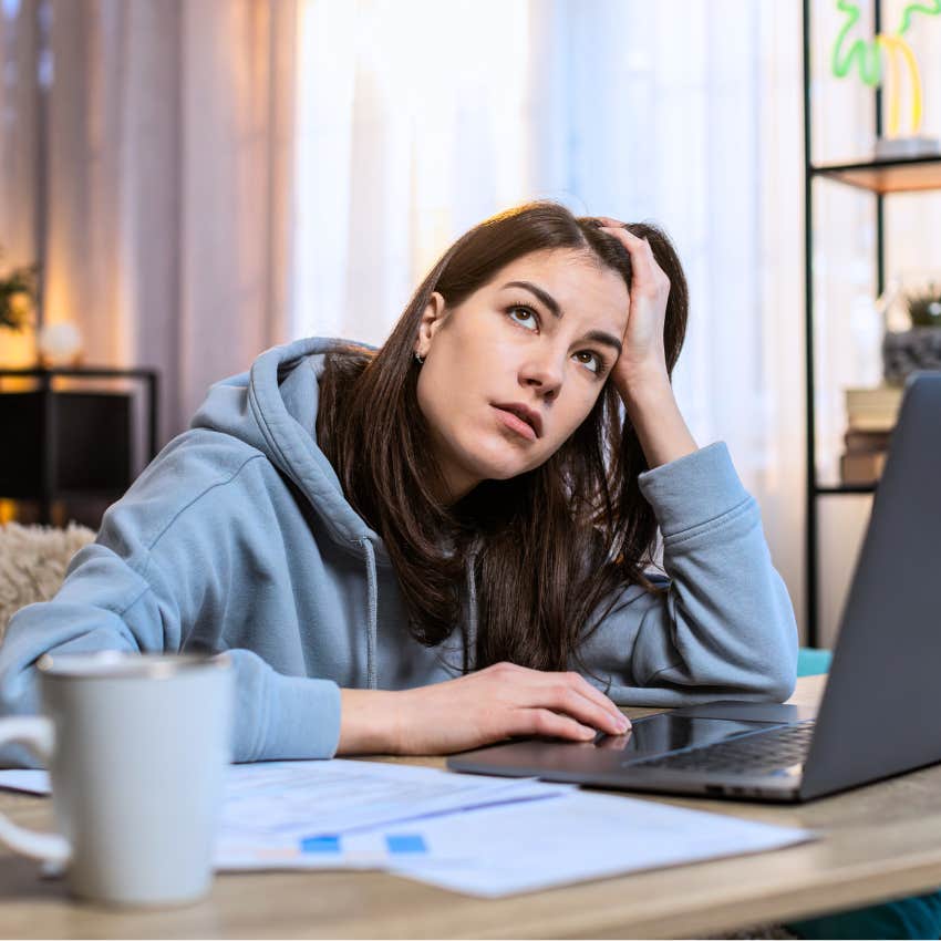 Woman spending more time avoiding things than doing them at work
