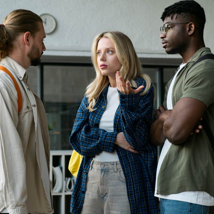 Uncomfortable woman saying "that came out wrong" with her friends.