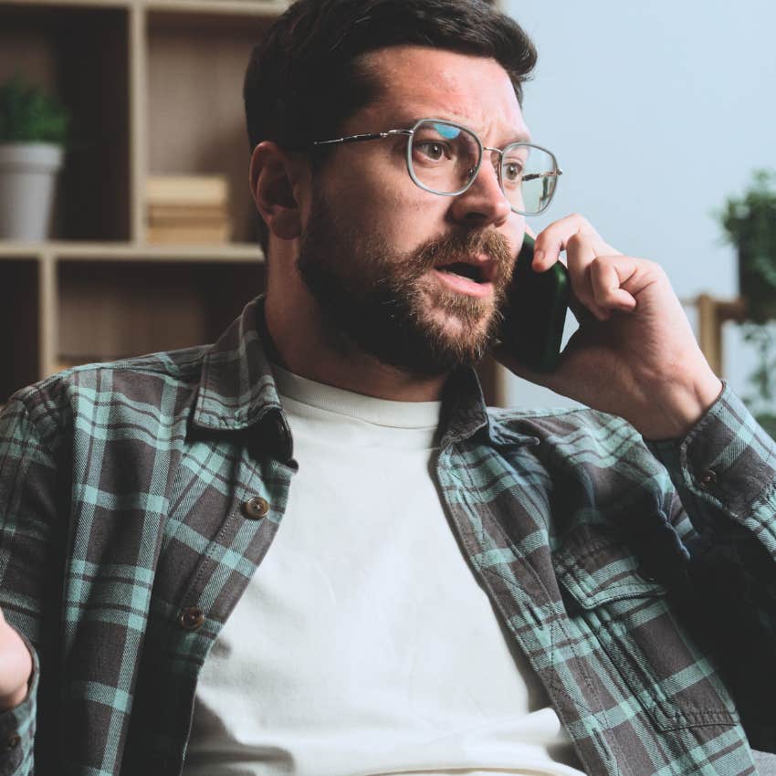Man saying "I don't owe you anything" on his phone. 