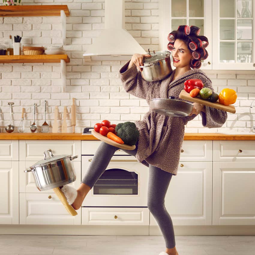 woman handling all her groceries on her own