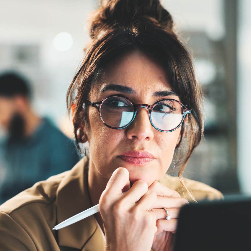 gen X woman who learns from her mistakes thinking at work