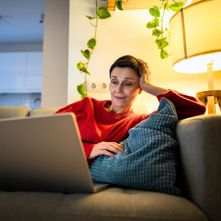 Woman watching comfort movies at home.