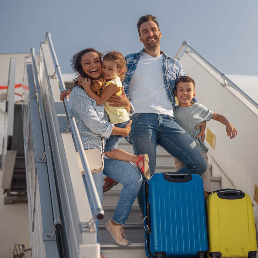 family traveling together on airplane