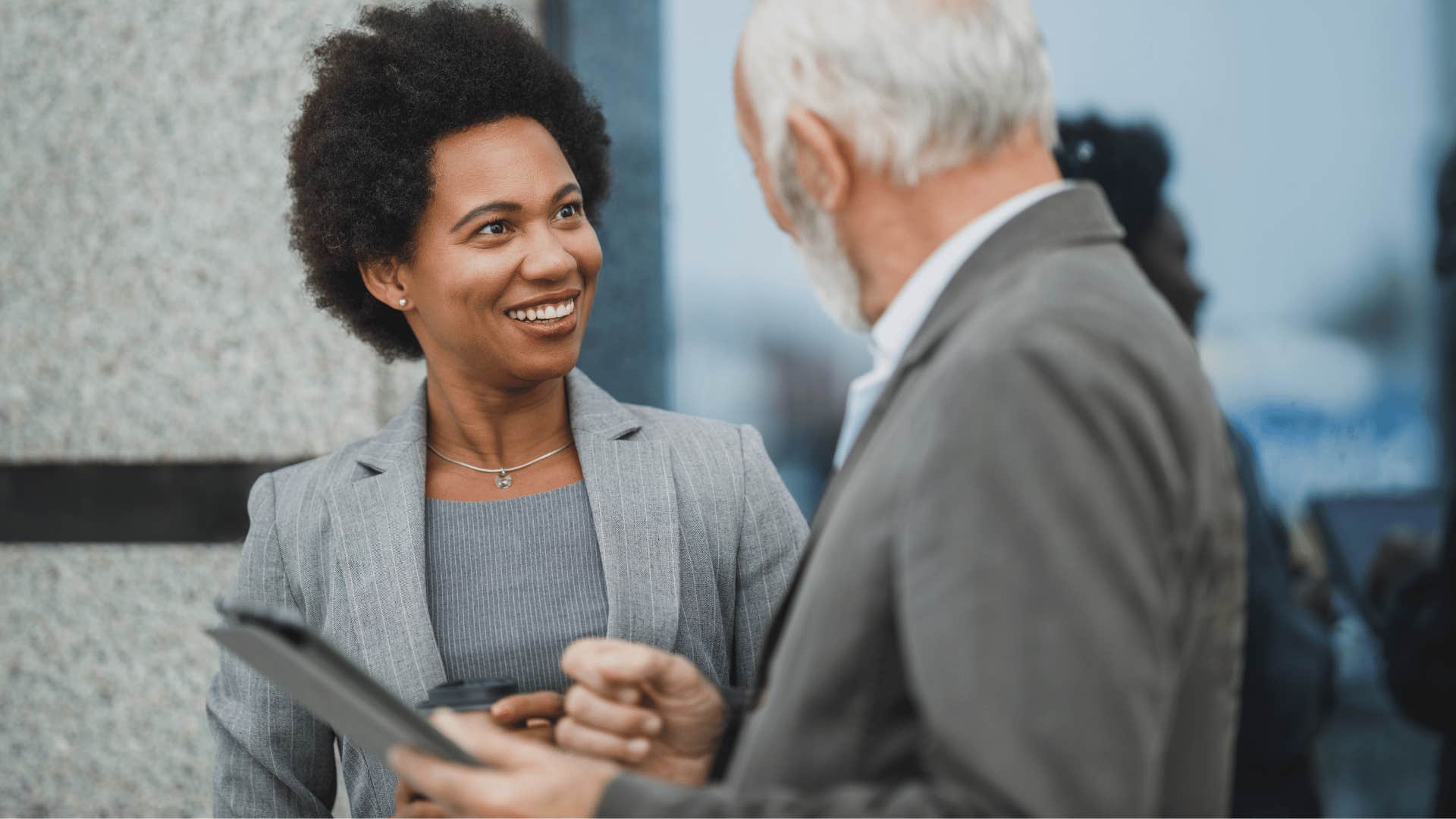 Woman who doesn't care what you think saying I'm excited about it to her boss
