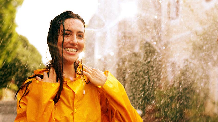 woman actually wants to be outside when it's raining