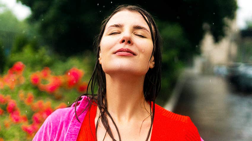 woman can't get enough of the smell after it rains