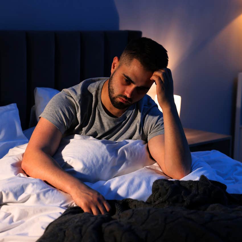 nervous man who needs a fan blowing on him to fall asleep