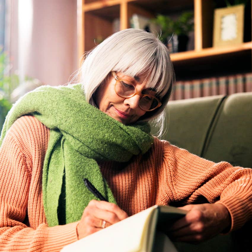 busy woman junk journaling at home for happiness