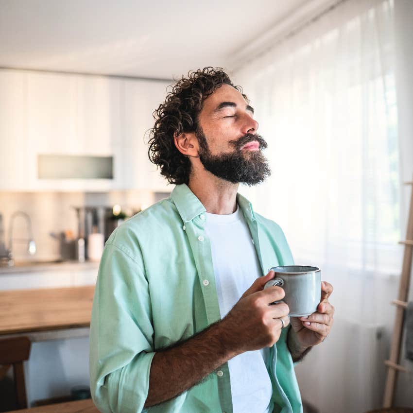 confident man feeling his emotions at home