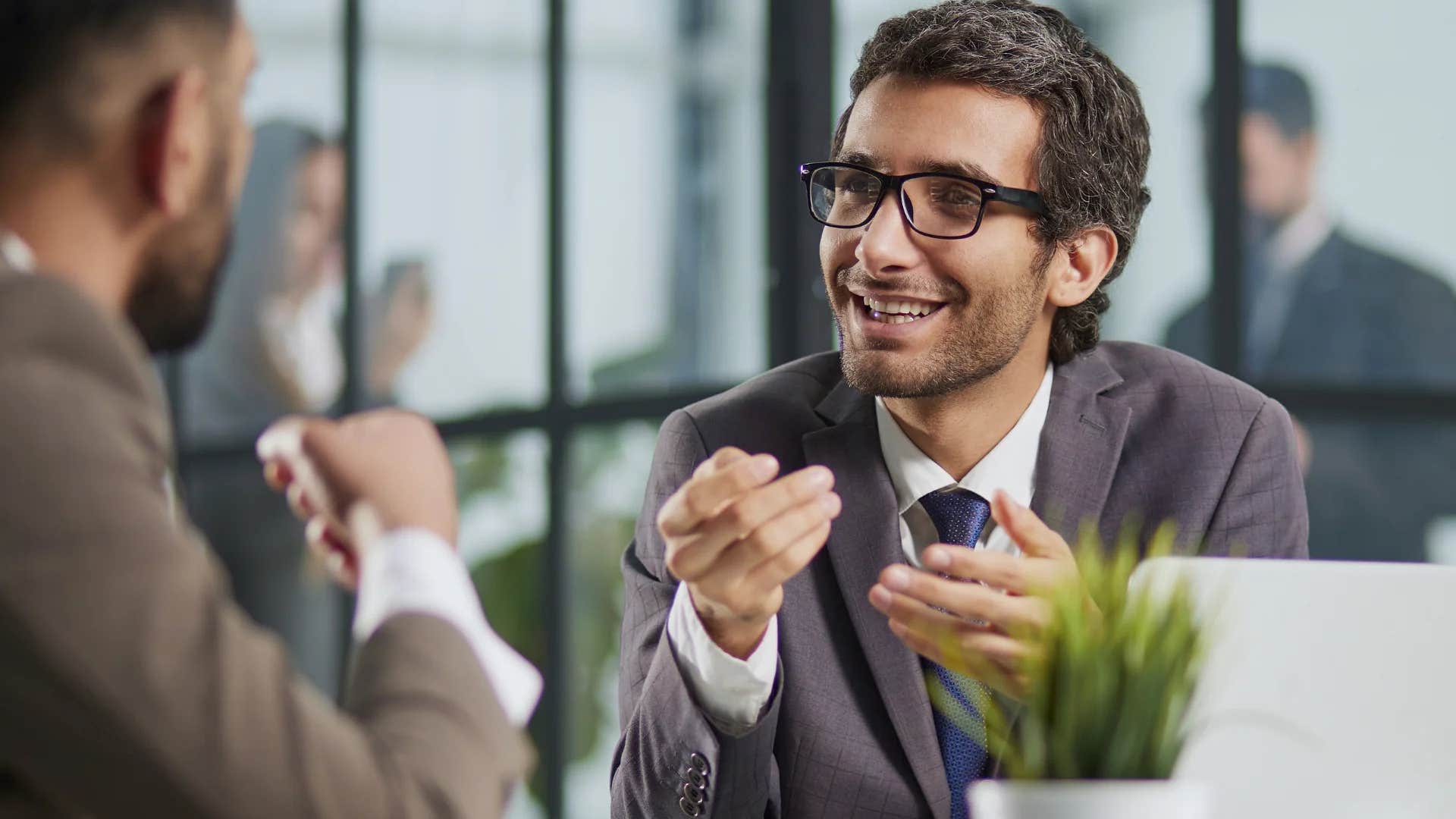 man overcomplicating simple tasks with work colleague