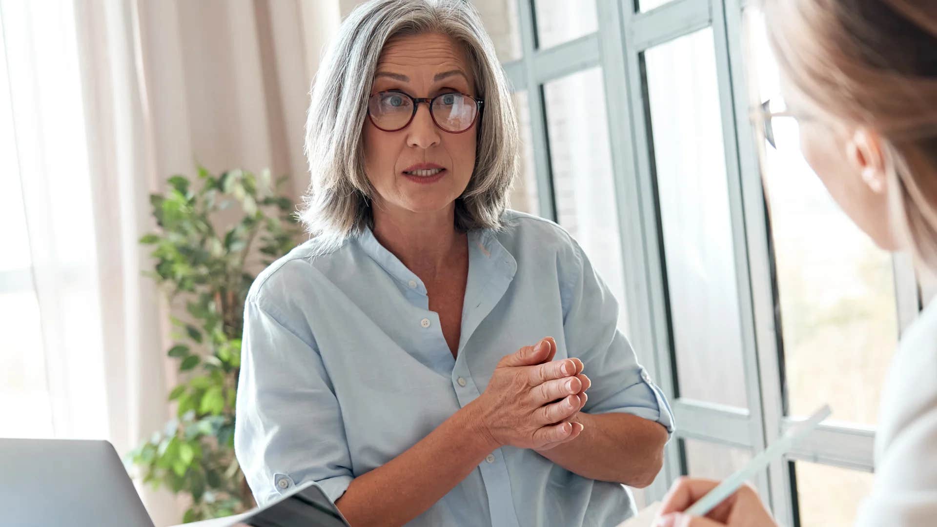 low-IQ woman viewing others as competition in heated exchange
