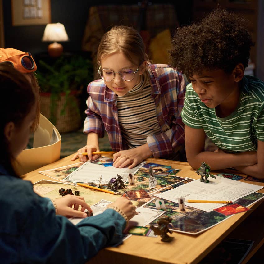 group of kids playing strategy games together