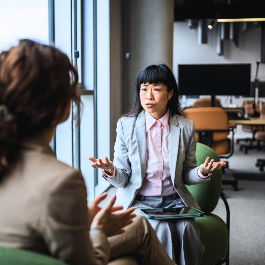 Woman saying this is how we've always done it to a coworker