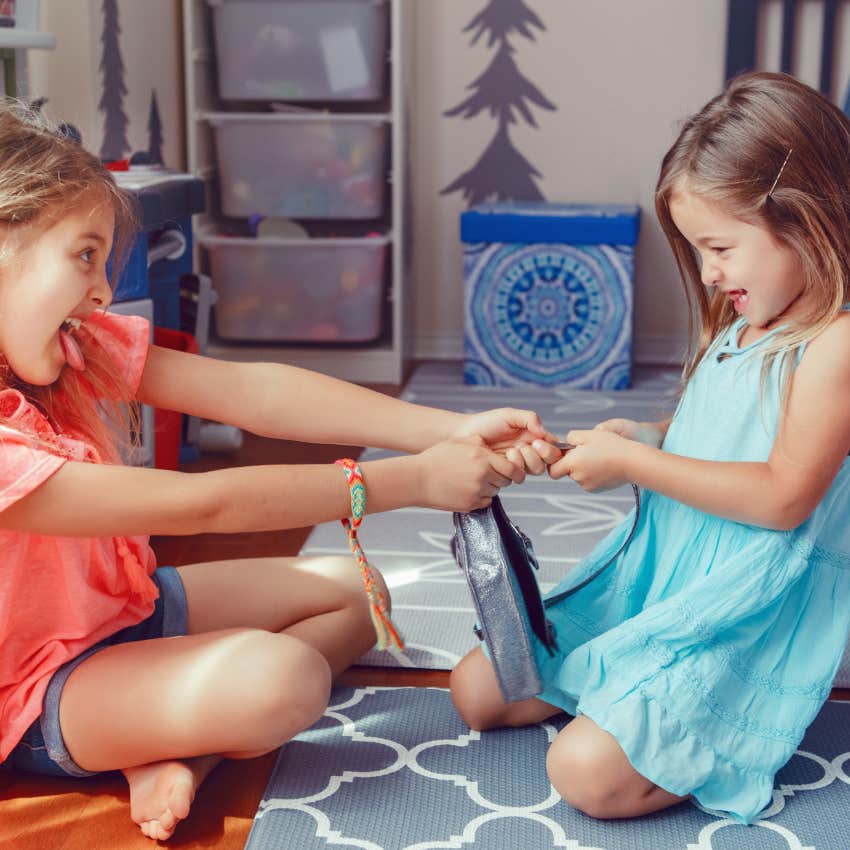 little girls being selfish and not sharing