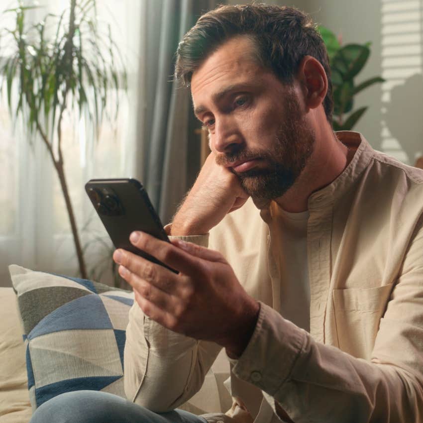 sad man waiting for his partner to respond to his messages