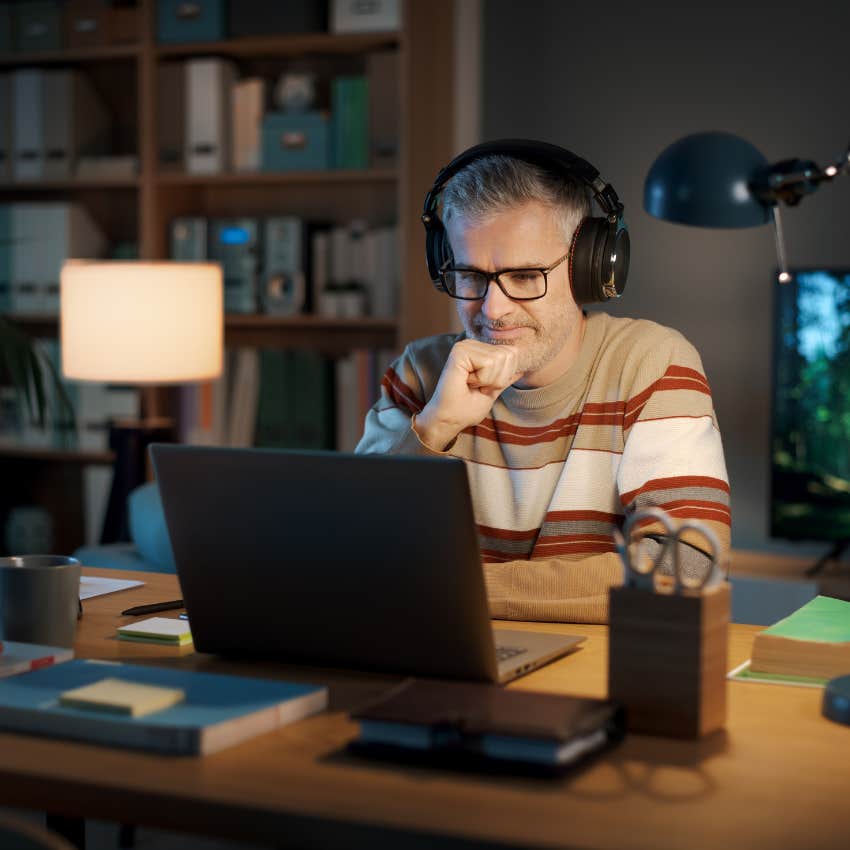man who prefers quiet evening and canceled plans learning a new language using laptop