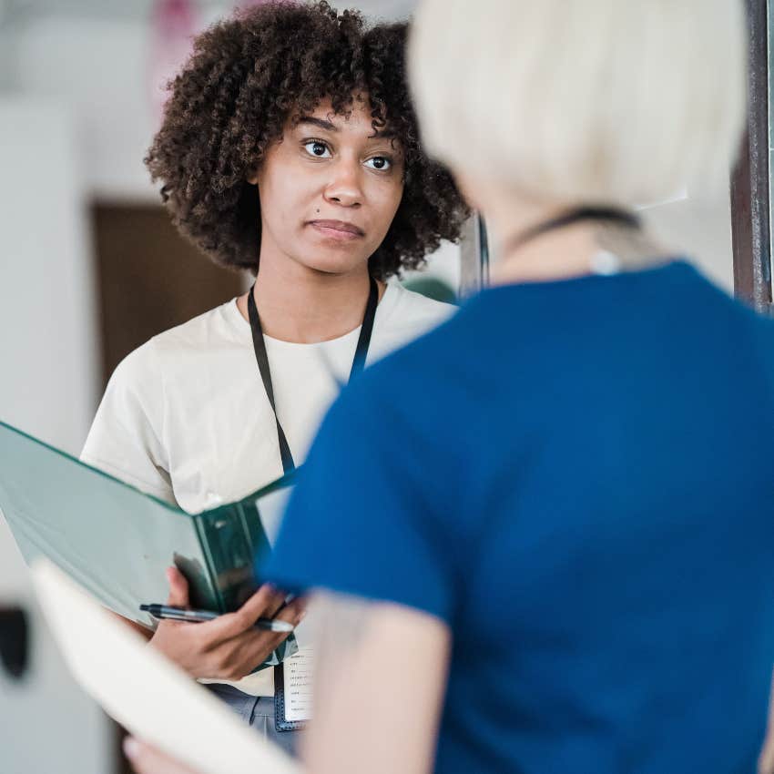 woman telling colleague thank you for your input politely