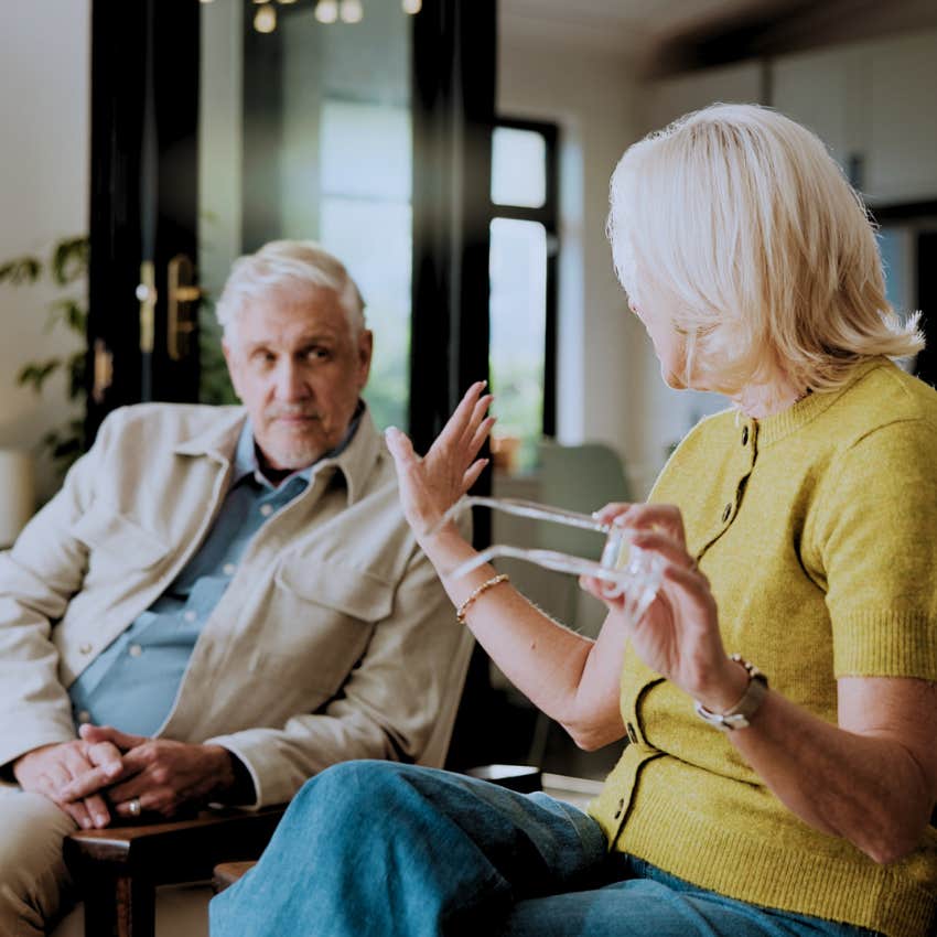 annoyed man saying cool to his upset wife at home