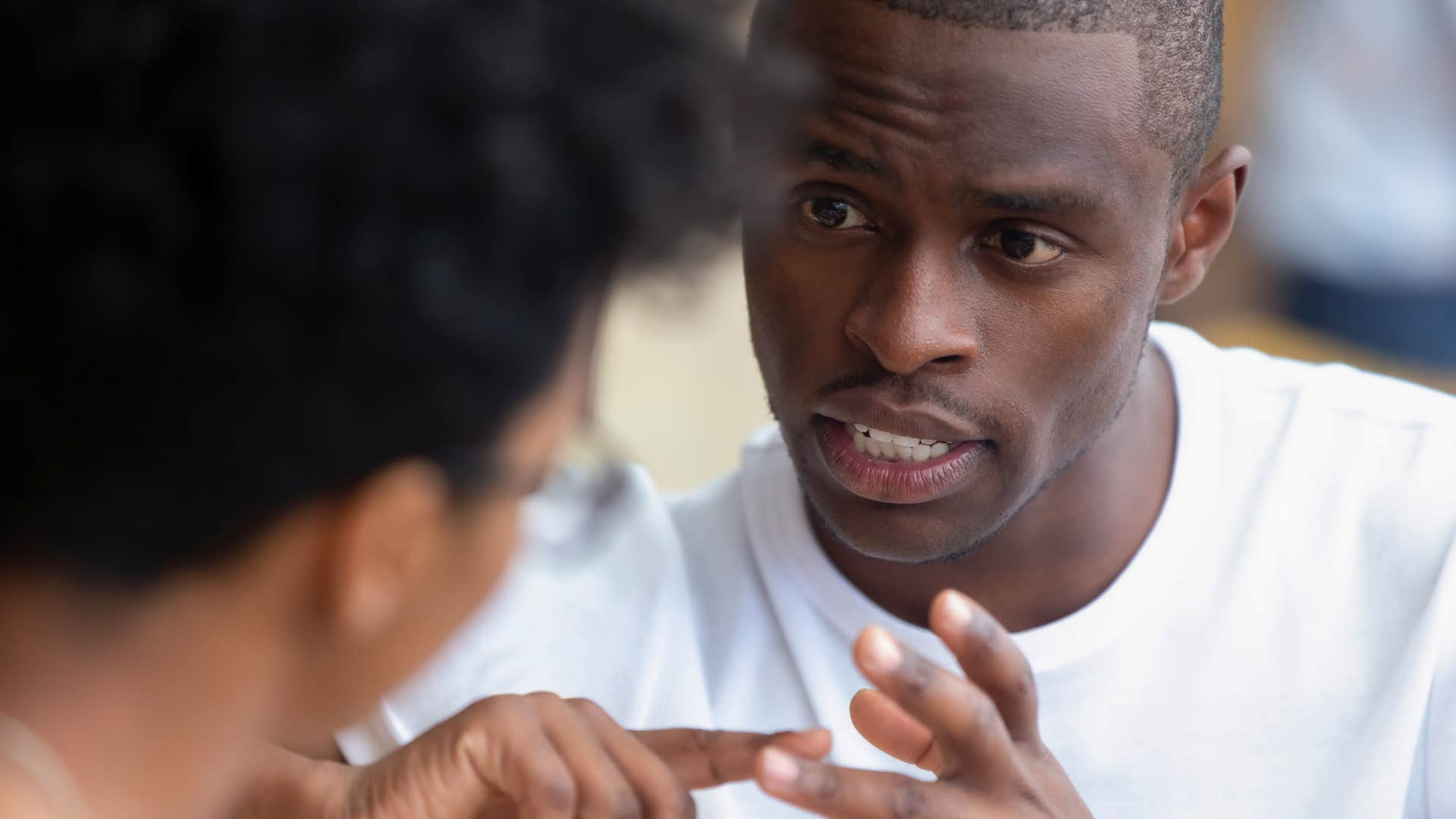authentic man telling friend i'm going to be honest