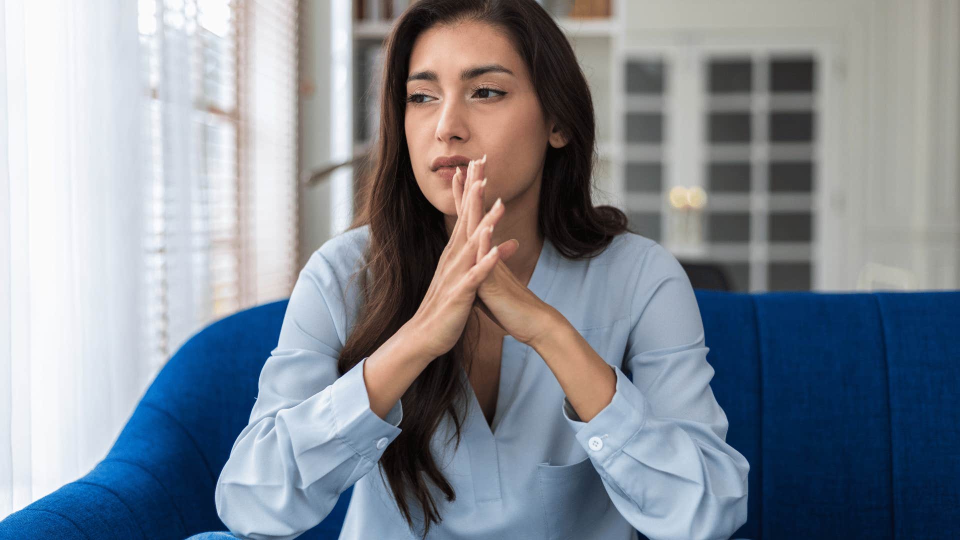woman planning what to tell her friends before she sees them