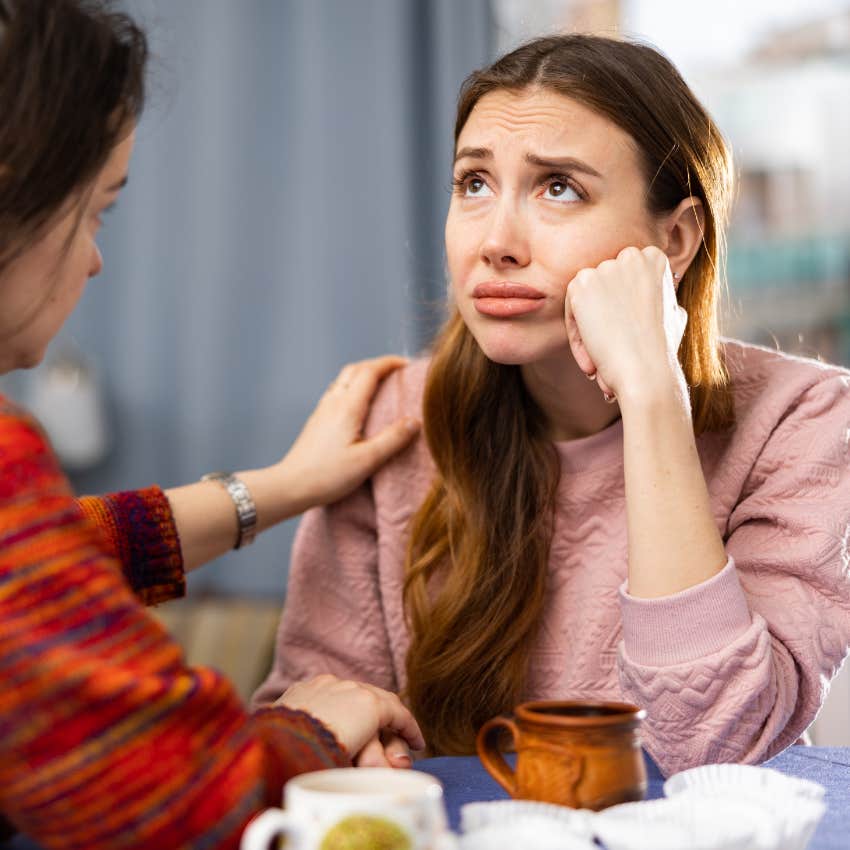 emotionally and mentally burnt out woman crying complaining to friend