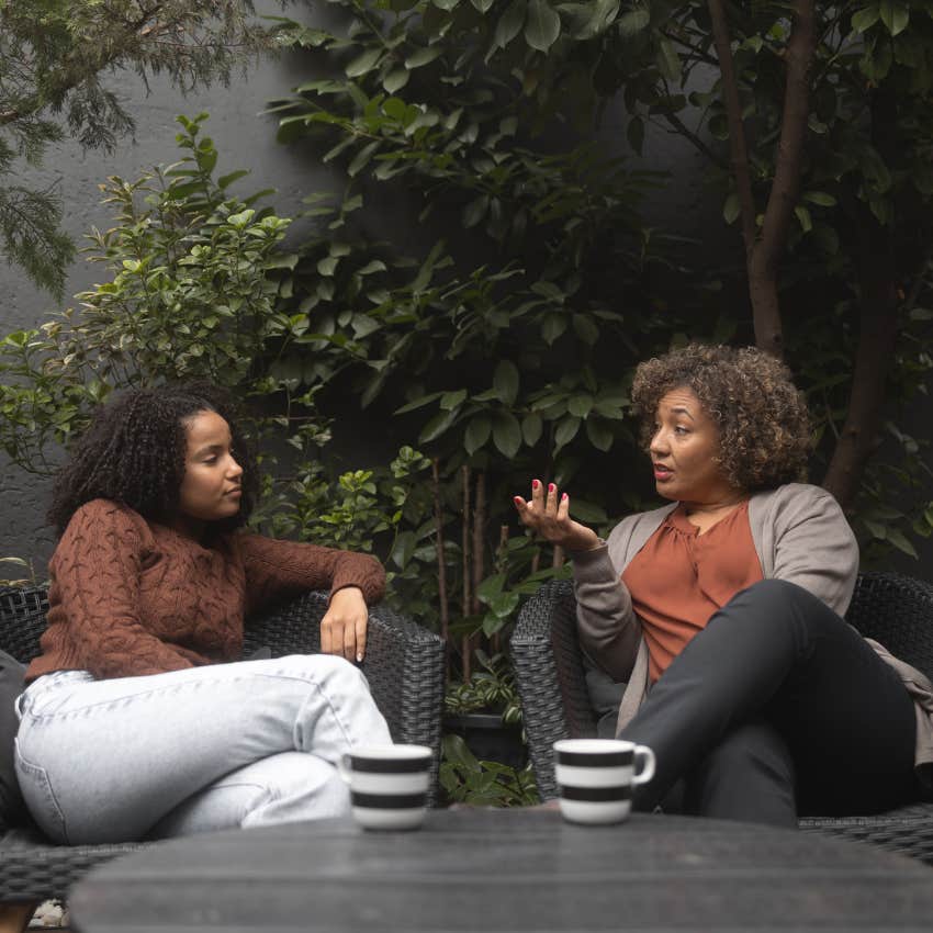 woman telling her friend she's sorry