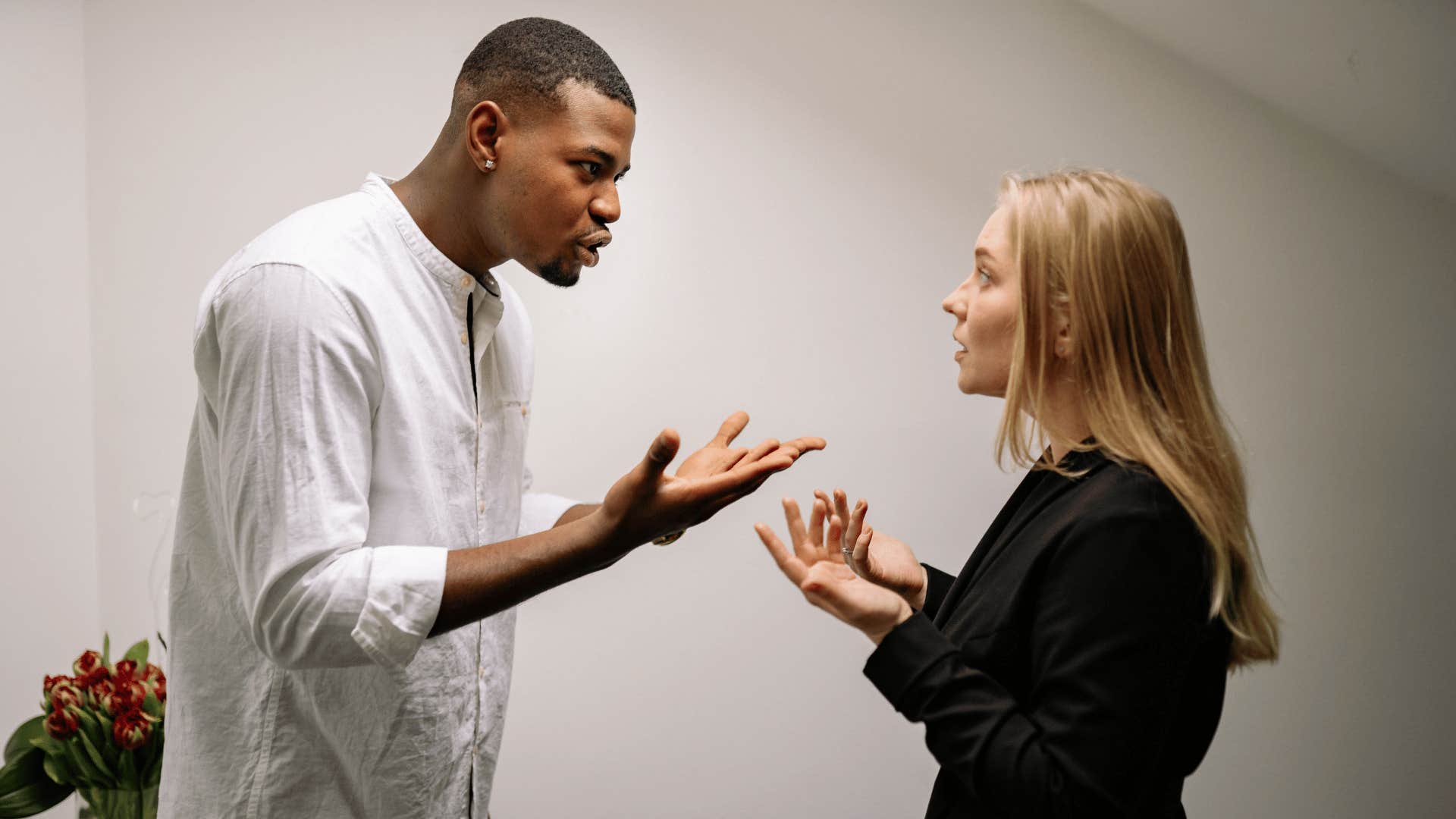 two people in an argument with man saying people don't deserve happiness