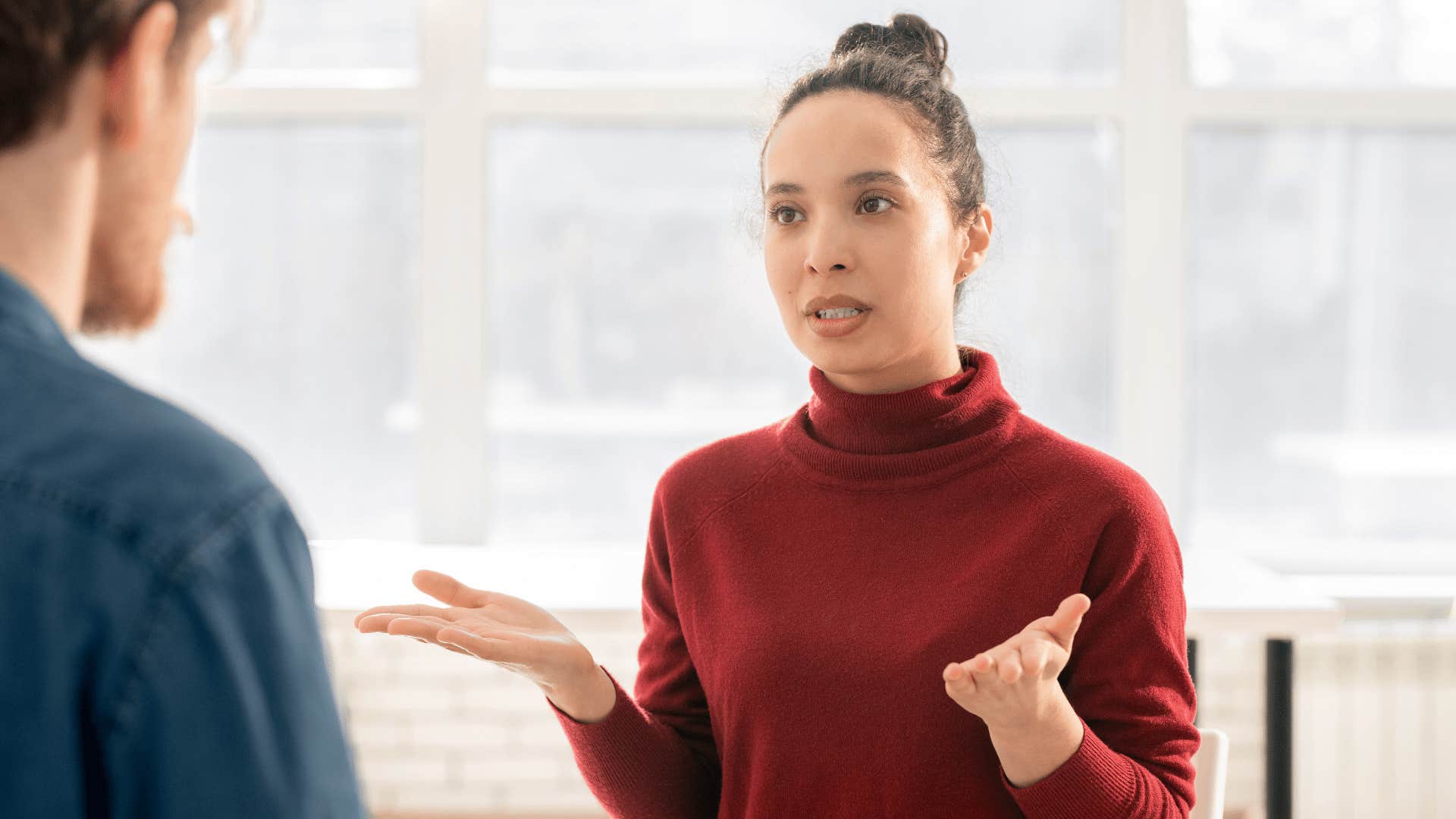 cruel mean woman telling colleague she's not apologizing