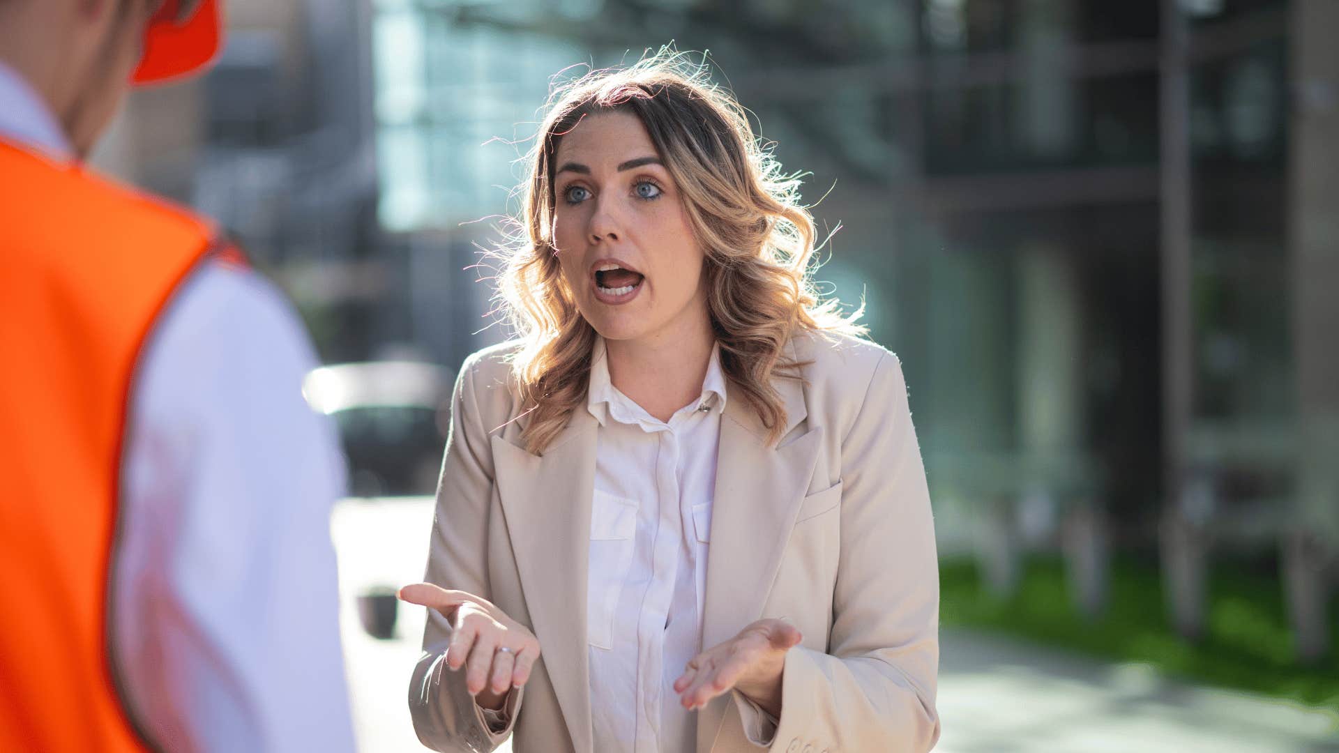unkind woman yelling at worker saying i didn't do anything wrong