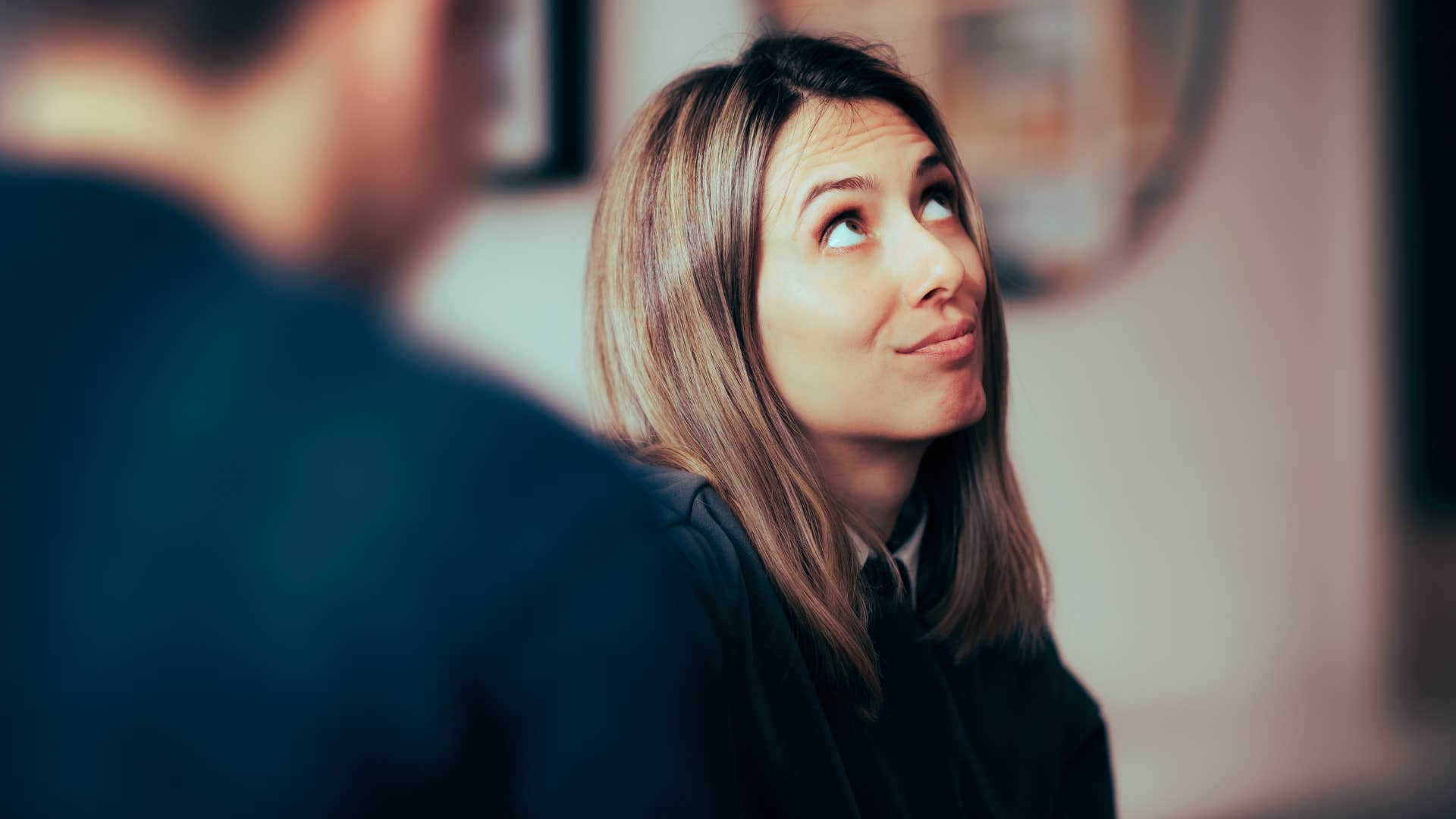 creepy woman telling man that people call her weird