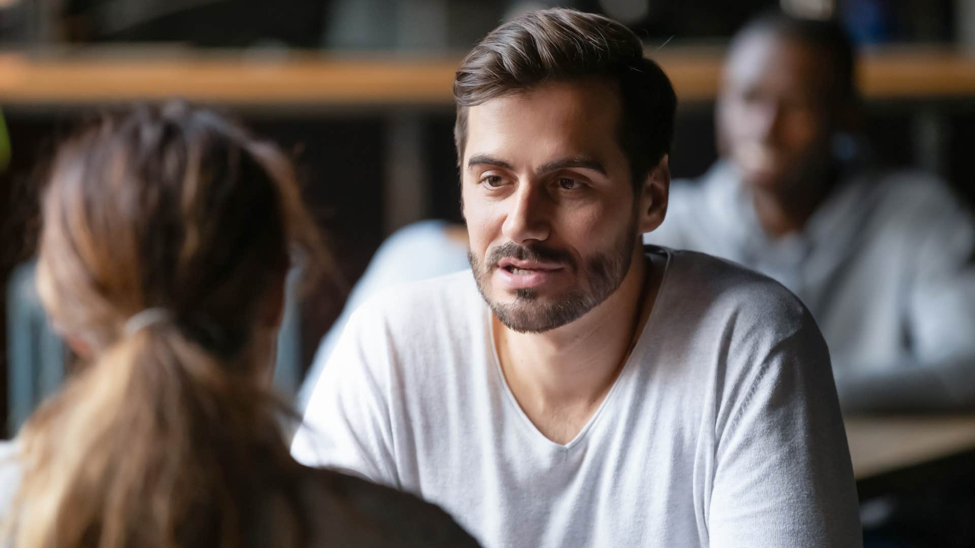 man on first date telling woman you look even better in person
